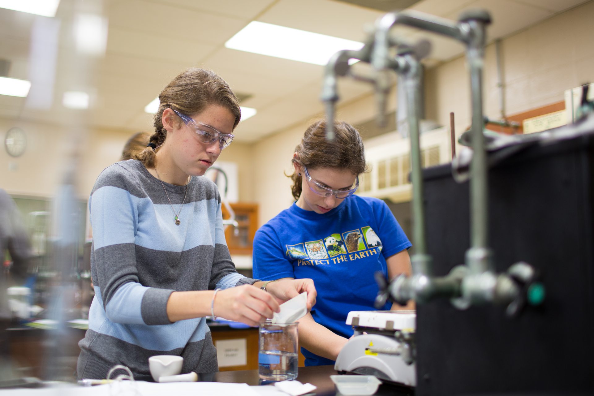 Students in chemistry lab working