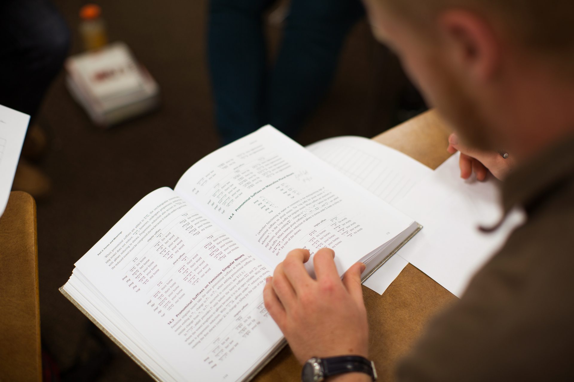 Student with open book