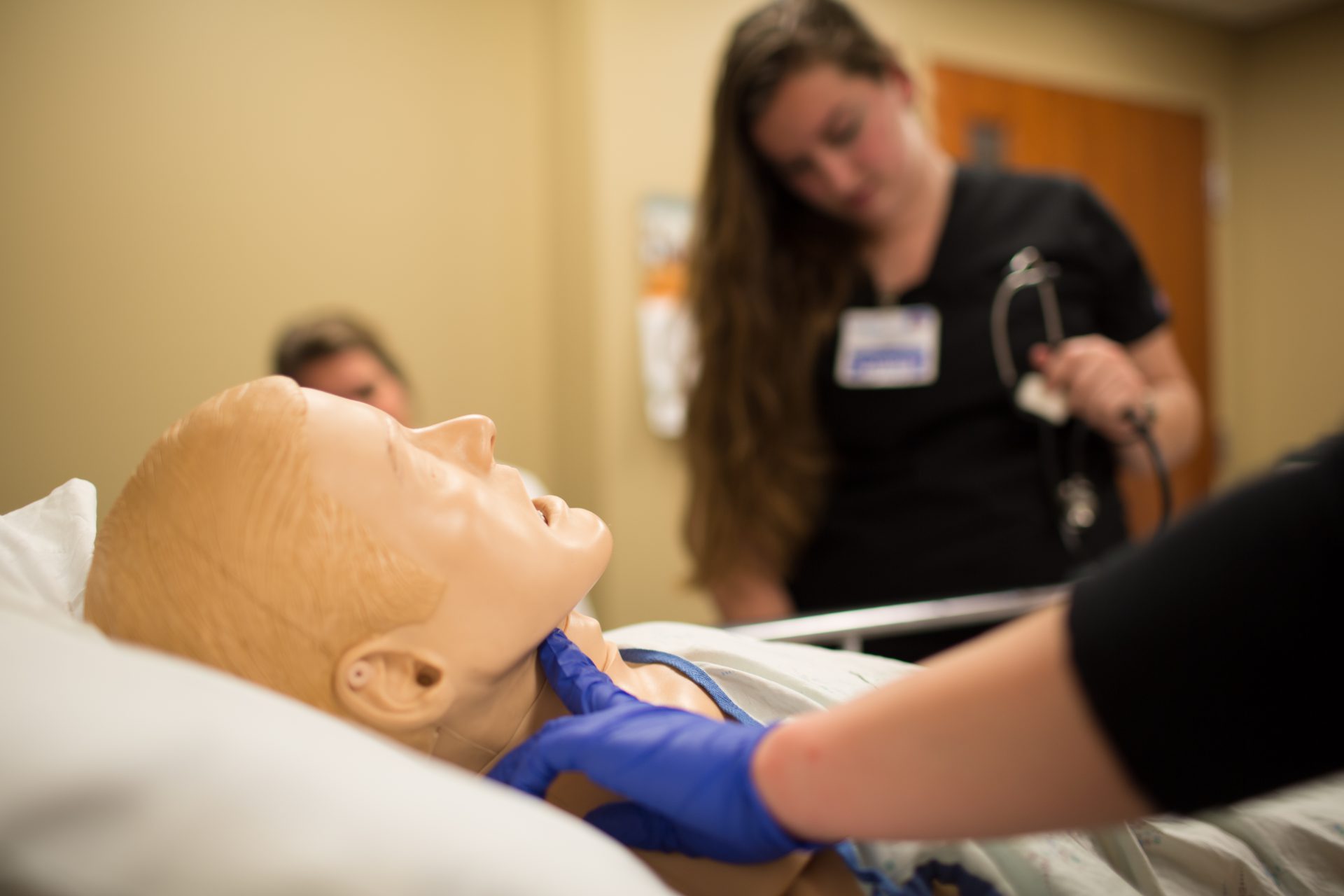 Nursing students with test dummy