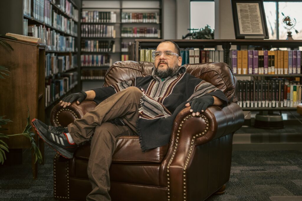 Interested in a Major in English? Grace College, a Christian College in Indiana offers a bachelor's in English that is relational. Professor Dr. Cesar Soto in the Library.