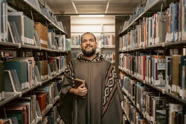 Interested in a Major in English? Grace College, a Christian College in Indiana offers a bachelor's in English that is relational. Professor Dr. Cesar Soto in the Library.