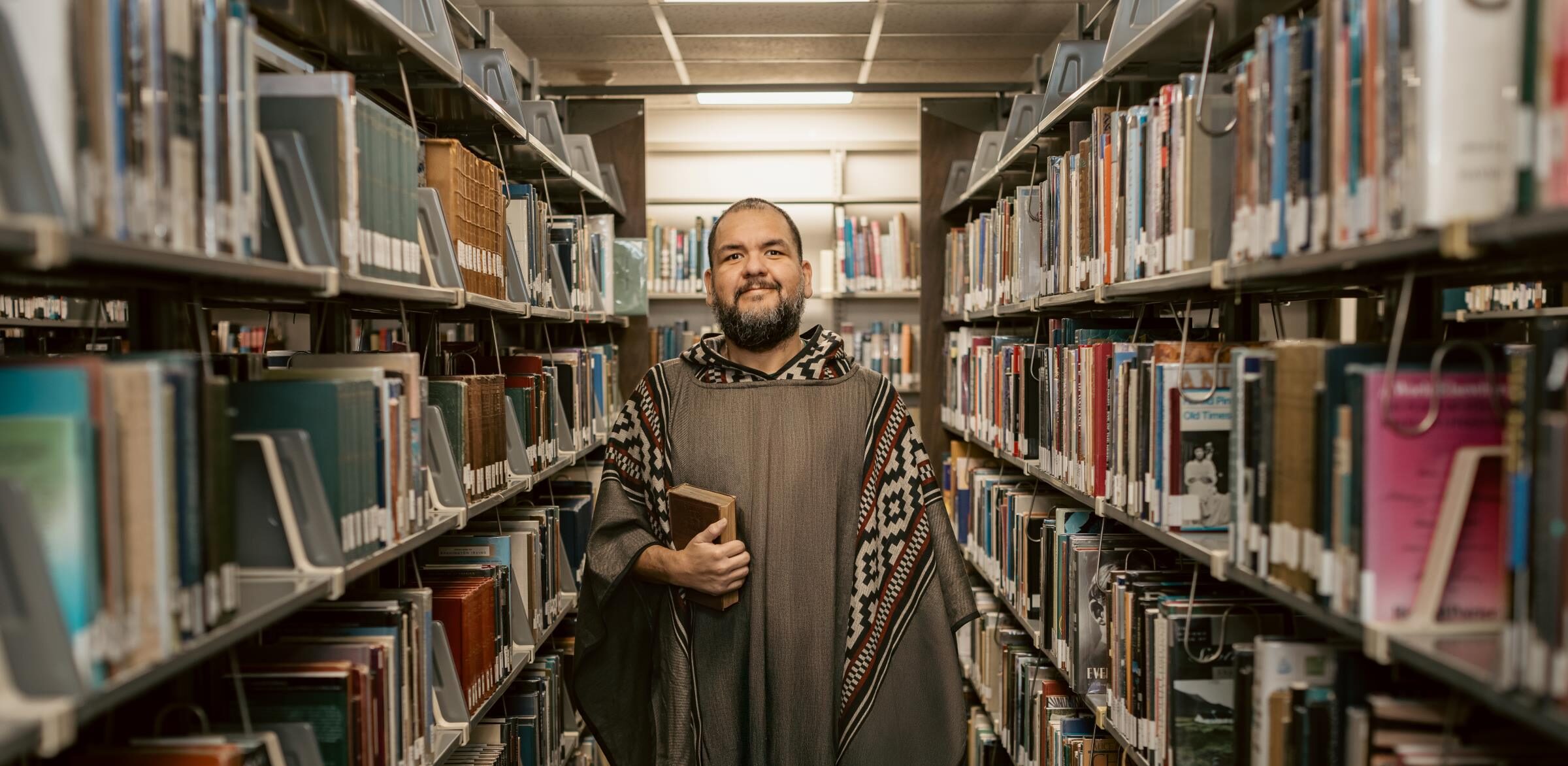 Interested in a Major in English? Grace College, a Christian College in Indiana offers a bachelor's in English that is relational. Professor Dr. Cesar Soto in the Library.